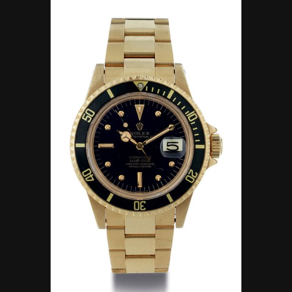 ROLEX. AN 18K GOLD AUTOMATIC WRISTWATCH WITH DATE, CENTER SECONDS AND BRACELET SIGNED ROLEX, OYSTER PERPTUAL DATE, SUBMARINER, 660FT=200M, CASE NO. 5835864, REF. 1680, CIRCA 1977