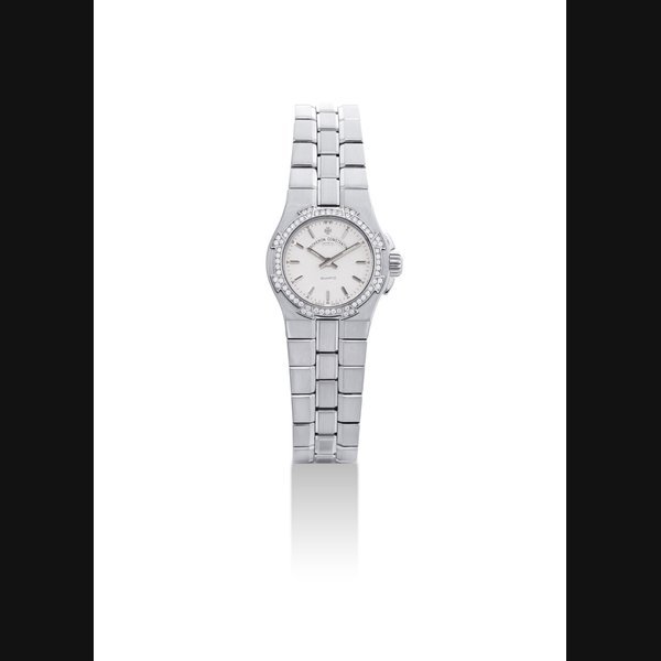 Vacheron Constantin VACHERON CONSTANTIN. A LADY'S STAINLESS STEEL AND DIAMOND-SET WRISTWATCH WITH BRACELET SIGNED VACHERON CONSTANTIN, GENEVE, QUARTZ, OVERSEAS MODEL, REF. 16550, MOVEMENT NO. 883'260, CASE NO. 715'996, CIRCA 2003
