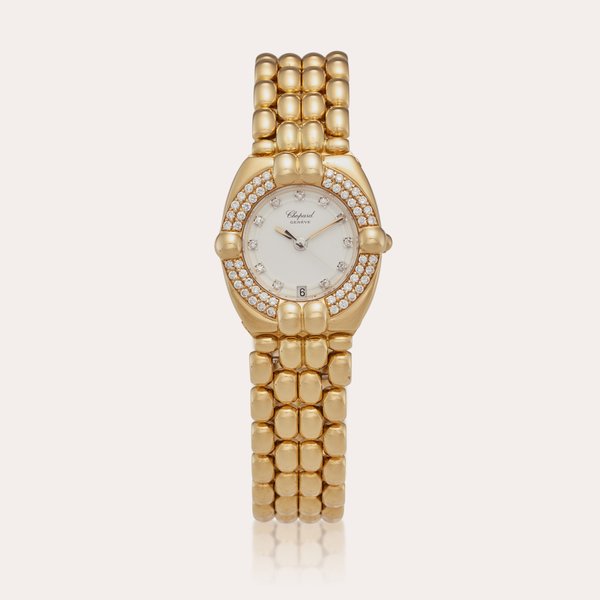 Chopard Reference 325219-0001 Gstaad | A yellow gold and diamond-set bracelet watch with date, Circa 1990
