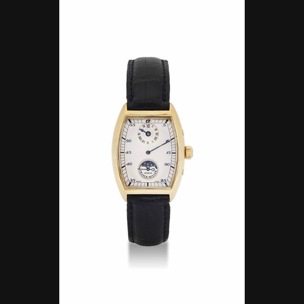 FRANCK MULLER. AN 18K GOLD TONNEAUSHAPED JUMP HOUR WRISTWATCH WITH MOON PHASES SIGNED FRANCK MULLER, GENEVE, NO. 16, REF. 7500 DS L, CIRCA 1998