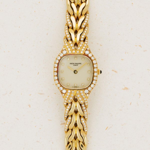 Patek Philippe Patek Philippe La Flamme 4715/003 18k YG with Diamonds 