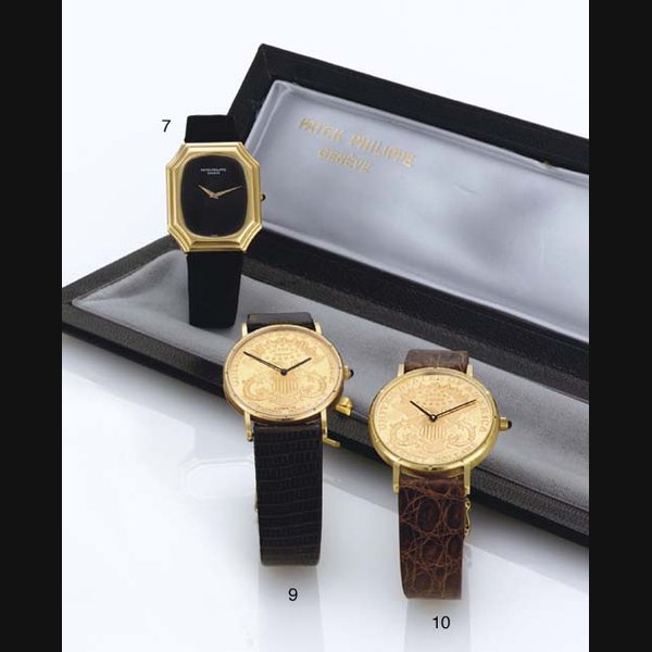 BAUME & MERCIER. AN 18K GOLD AUTOMATIC COIN WRISTWATCH SIGNED BAUME & MERCIER, CIRCA 1990