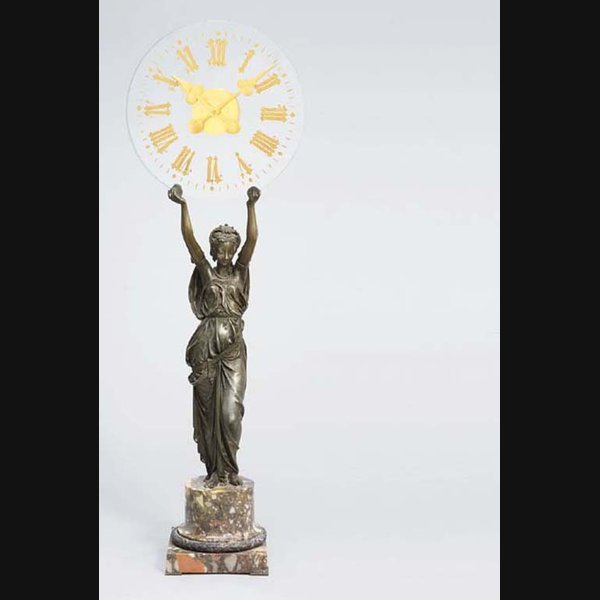 A Napoleon III bronze-patinated metal, breccia marble and glass plate mystery-type figural mantel timepiece CIRCA 1880