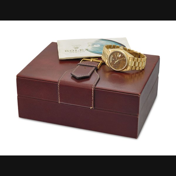 ROLEX. A VERY FINE AND RARE 18K GOLD AUTOMATIC WRISTWATCH WITH SWEEP CENTRE SECONDS, DAY, DATE, WOODEN DIAL, BRACELET, PERIOD BROCHURE AND BOX Signed Rolex, Oyster Perpetual, Day-Date, ref. 18038, case no 5’447’102, circa 1978