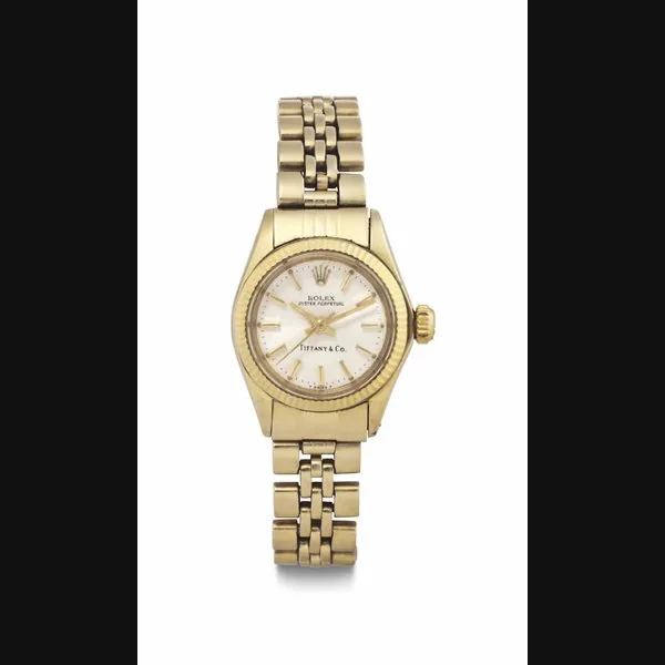 ROLEX. A LADY'S 18k GOLD AUTOMATIC WRISTWATCH WITH CENTER SECONDS AND BRACELET SIGNED ROLEX, RETAILED BY TIFFANY & CO., OYSTER PERPETUAL, REF. 6719, CASE NO. 5108125, CIRCA 1971
