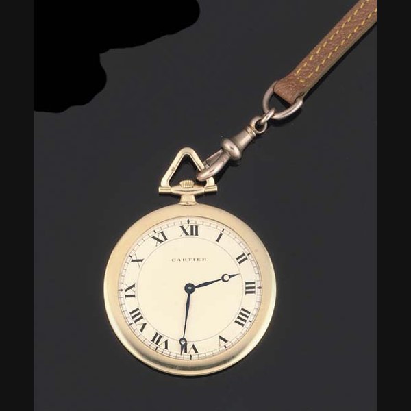 Cartier Cartier. An interesting 18ct Gold Slim Shutter Watch together with associated 18ct gold chain SIGNED CARTIER, EUROPEAN CLOCK AND WATCH CO, CASE NO 28840, 1163, LONDON HALLMARK FOR 1935