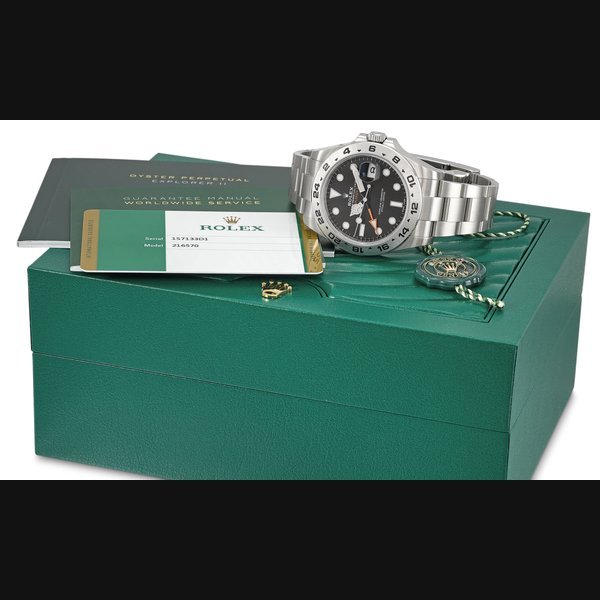 Rolex ROLEX. A STAINLESS STEEL AUTOMATIC DUAL TIME WRISTWATCH WITH SWEEP CENTRE SECONDS, DATE, 24 HOUR HAND, BRACELET, ORIGINAL GUARANTEE AND BOX SIGNED ROLEX OYSTER PERPETUAL DATE, EXPLORER II, REF. 216570, CASE NO. 1S7133D1, CIRCA 2019 · 216570