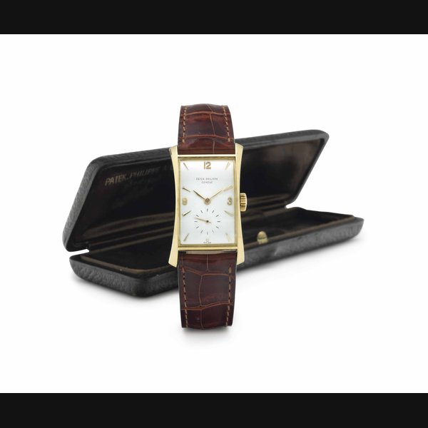 Patek Philippe. An 18k Gold Rectangular-Shaped Wristwatch SIGNED PATEK PHILIPPE, GENEVE, REF. 1593, MOVEMENT NO. 975'503, CASE NO. 677'888, MANUFACTURED IN 1953