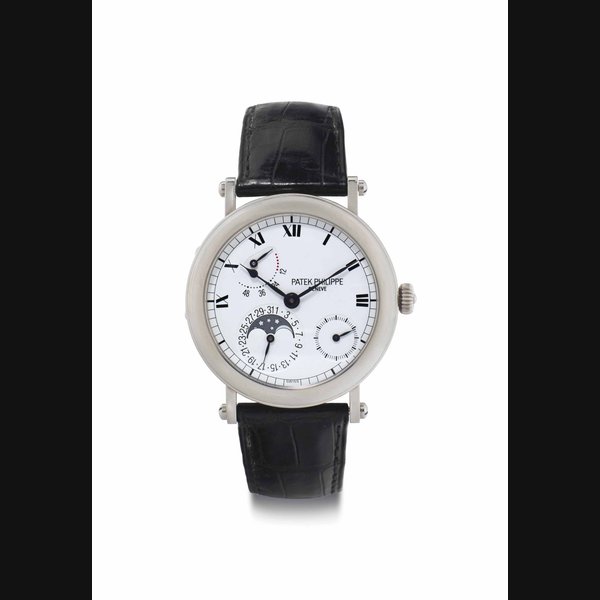 Patek Philippe. An 18k White Gold Automatic Wristwatch with Power Reserve, Date, and Phases of the Moon SIGNED PATEK PHILIPPE, GENÈVE, REF. 5054, MOVEMENT NO. 3'113'968, CASE NO. 4'116'620, MANUFACTURED IN 2001