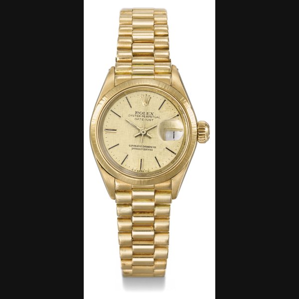 ROLEX. AN 18K GOLD AUTOMATIC WRISTWATCH WITH SWEEP CENTRE SECONDS, DATE, LINEN-TEXTURED GILT DIAL, BEZEL AND BRACELET SIGNED ROLEX, OYSTER PERPETUAL, DATEJUST, LADY DATEJUST MODEL, REF. 6917, CASE NO. 4’099’039, CIRCA 1975