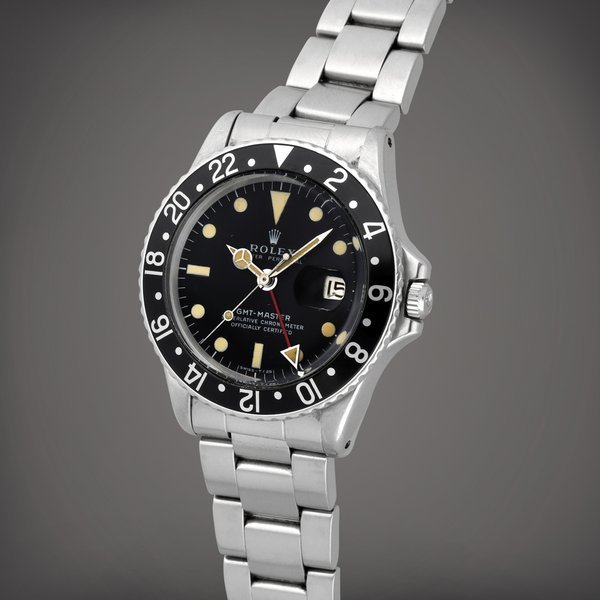 Rolex GMT-Master, Reference 1675 | A stainless steel dual time zone wristwatch with date, bracelet and additional 'Pepsi' bezel | Circa 1972 · 1675