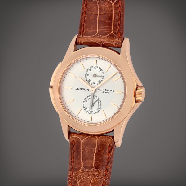 Patek Philippe Travel Time 'Gübelin 150th anniversary', Reference 5134R-010 |  A pink gold dual time wristwatch with 24-hour indication | Circa 2004 · 5134R-010