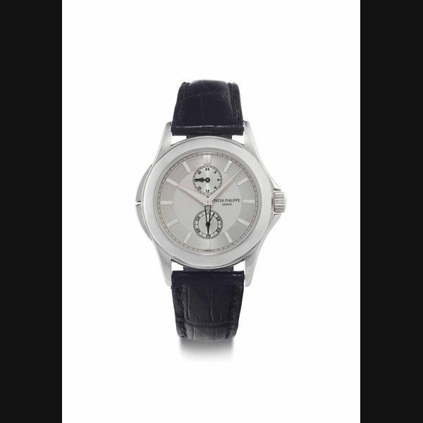 Patek Philippe. A Fine and Rare Platinum Dual Time Wristwatch SIGNED PATEK PHILIPPE, GENÈVE, CALATRAVA TRAVEL TIME MODEL, REF. 5134, MOVEMENT NO. 3'087'487, CASE NO. 4'255'293, MANUFACTURED IN 2004