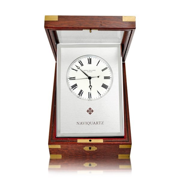 Patek Philippe Patek Philippe | Reference E1200, An aluminum table clock with fitted wooden case, Circa 1970 | 百達翡麗 | 型號E1200   鋁金屬座鐘，備木製盒子，約1970年製 · E1200