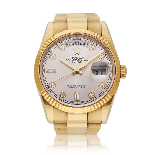 Rolex Reference 118238 Day-Date | A yellow gold and diamond-set wristwatch with day, date and bracelet, Circa 2017 · 118238