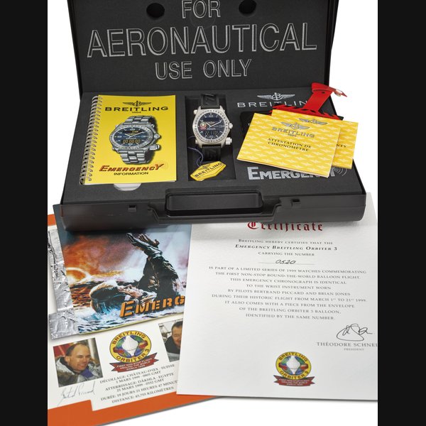 BREITLING. A LARGE TITANIUM LIMITED EDITION MULTIFUNCTION PILOT’S FLYBACK CHRONOGRAPH WRISTWATCH WITH ANALOG AND DIGITAL DISPLAY, ALARM, DATE, DAY OF THE WEEK, MONTH, YEAR, COUNTDOWN TIMER, POWER RESERVE AND BOX SIGNED BREITLING, ORBITER 3 EMERGENCY MODEL, LIMITED EDITION 520/1999, REF. E56321, CASE NO. 7916, CIRCA 2000