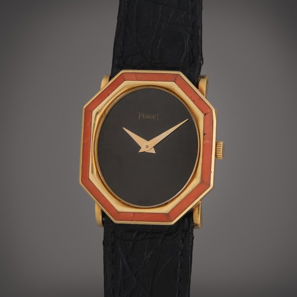 Piaget Reference 9341 | A yellow gold and coral wristwatch with onyx dial, Circa 1980