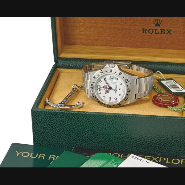 Rolex Rolex. A fine stainless steel automatic dual time wristwatch with sweep centre seconds, date, bracelet, Guarantee and box Signed Rolex, Oyster Perpetual Date, Explorer II, ref. 16570, case no. F594276, circa 2005 · 16570