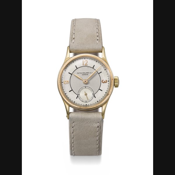 PATEK PHILIPPE. AN ATTRACTIVE 18K GOLD WRISTWATCH WITH TWO-TONE SECTOR DIAL REF. 448, MOVEMENT NO. 823’612, CASE NO. 294’385, MANUFACTURED IN 1930