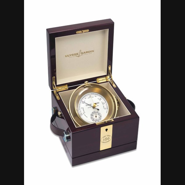 ULYSSE NARDIN. AN UNUSUAL GILT BRASS LIMITED EDITION BAROMETER SIGNED ULYSSE NARDIN, LOCLE SUISSE, CIRCA 2006