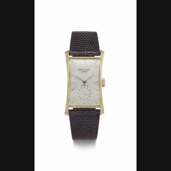 Patek Philippe. A Fine 18k Gold Rectangular Wristwatch SIGNED PATEK PHILIPPE, GENÈVE, RETAILED BY GÜBELIN, REF. 1593, MOVEMENT NO. 974'753, CASE NO. 674'244, MANUFACTURED IN 1952