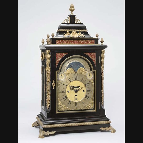 A Dutch giant ebonised and brass-mounted striking and musical table clock with moonphase 19TH CENTURY WITH EARLIER COMPONENTS