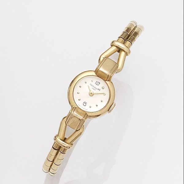 Patek Philippe Patek Philippe. A lady's 18K gold manual wind bracelet watch Case No.507261, Movement No.865380, Circa 1950