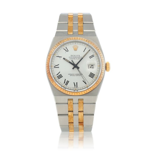 Rolex Oysterquartz, ref. 17013  Stainless steel and yellow gold wristwatch with date and bracelet  Circa 1979