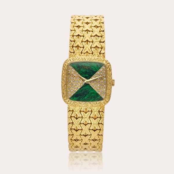 Piaget Reference 9902 N91 | A yellow gold and diamond-set cushion-shaped wristwatch with bracelet and maw sit sit dial, Circa 1980's