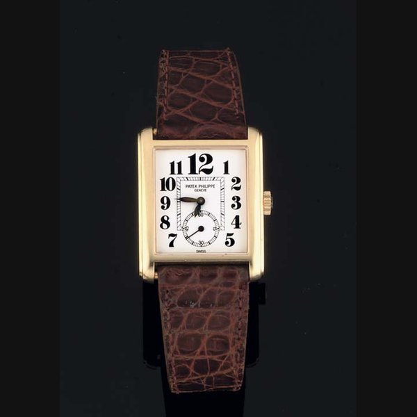 Patek Philippe Patek Philippe. An 18ct Gold Rectangular Cased Wristwatch SIGNED PATEK PHILIPPE, MODEL GONDOLO, CASE NO 2980115, MOVEMENT NO 1850104, REF 5014, 1997