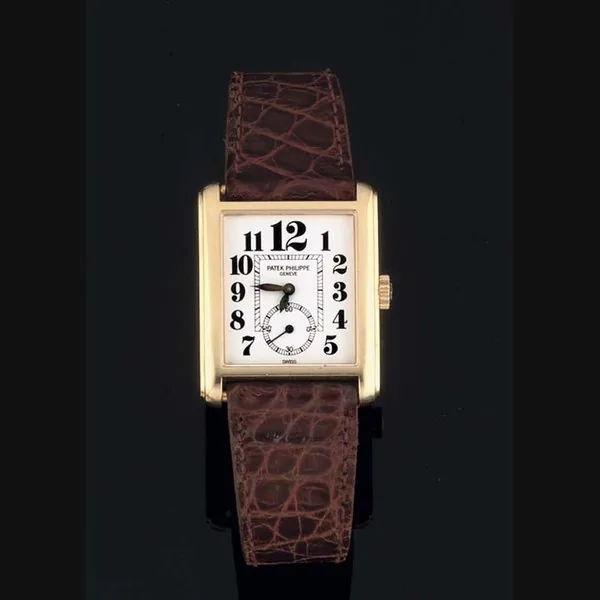 Patek Philippe. An 18ct Gold Rectangular Cased Wristwatch SIGNED PATEK PHILIPPE, MODEL GONDOLO, CASE NO 2980115, MOVEMENT NO 1850104, REF 5014, 1997