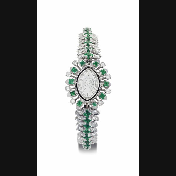 Iwc IWC. A Lady's Elegant 18k White Gold, Diamond and Emerald-set Bracelet Watch SIGNED INTERNATIONAL WATCH CO., REF. 9822, CASE NO. 1'603'569, MANUFACTURED IN 1966, Price & Market Data