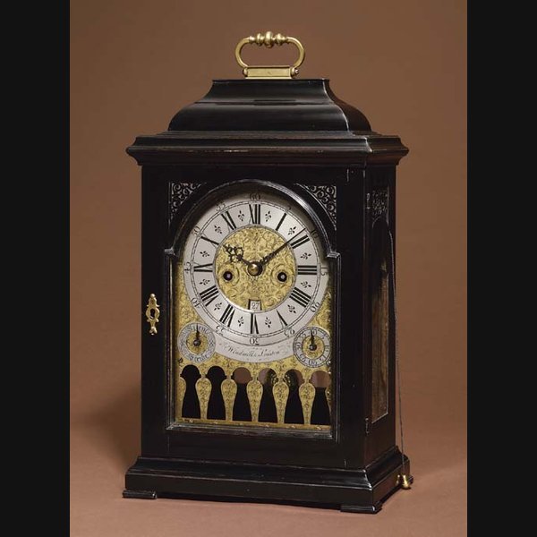 A Queen Anne ebonised striking eight day table clock with pull quarter repeat WINDMILLS. CIRCA 1710
