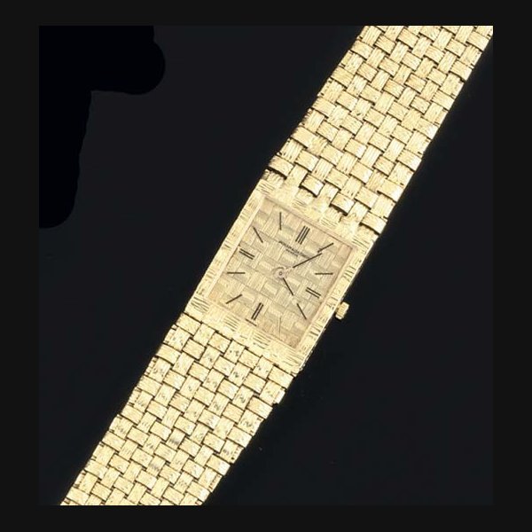 Vacheron & Constantin Vacheron & Constantin. An 18ct Gold Rectangular textured Finish wristwatch with Basket weave bracelet SIGNED VACHERON & CONSTANTIN, CASE NO 7186, 454065, MOVEMENT NO 631734, CIRCA 1980