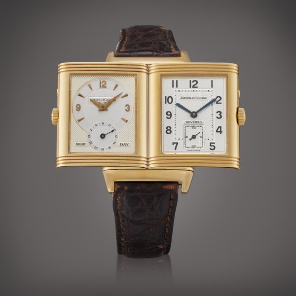 Jaeger-LeCoultre Reference 270.154 Reverso Duoface | A yellow gold rectangular dual time wristwatch with day/night indication, Circa 2000