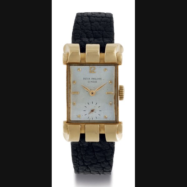 Patek Philippe PATEK PHILIPPE. A FINE AND RARE 18K GOLD WRISTWATCH WITH FANCY LUGS SIGNED PATEK PHILIPPE, GENEVA, MOVEMENT NO. 973591, CASE NO. 666981, REF. 2471, MANUFACTURED IN 1951, Price & Market Data