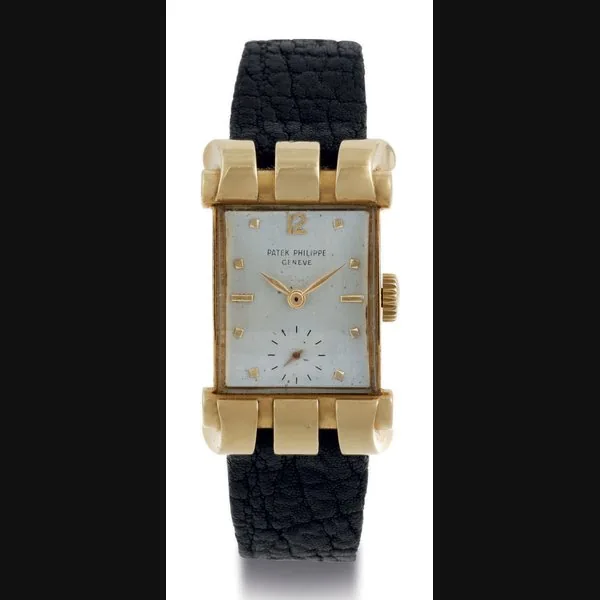 PATEK PHILIPPE. A FINE AND RARE 18K GOLD WRISTWATCH WITH FANCY LUGS SIGNED PATEK PHILIPPE, GENEVA, MOVEMENT NO. 973591, CASE NO. 666981, REF. 2471, MANUFACTURED IN 1951