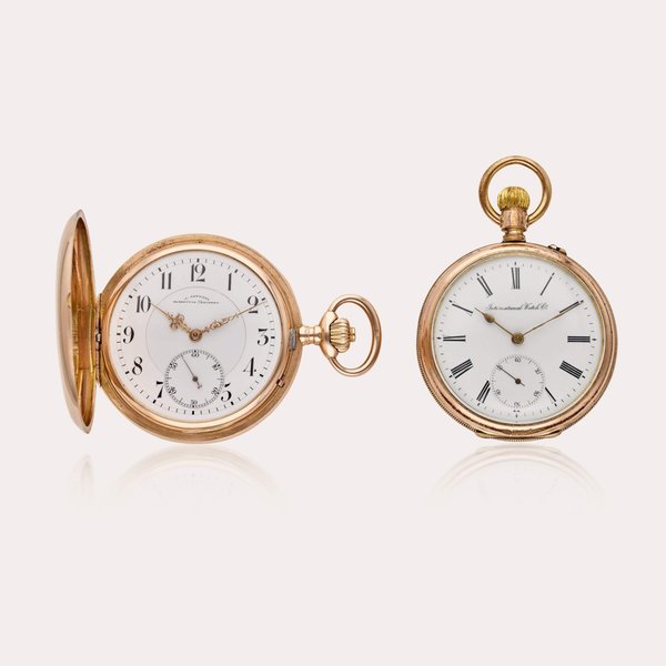 J. Assmann, Glashütte | IWC A group of two watches including a pink gold hunting cased watch by J. Assmann, Glashütte, and a pink gold plated open-faced watch by IWC, Circa 1895-1910