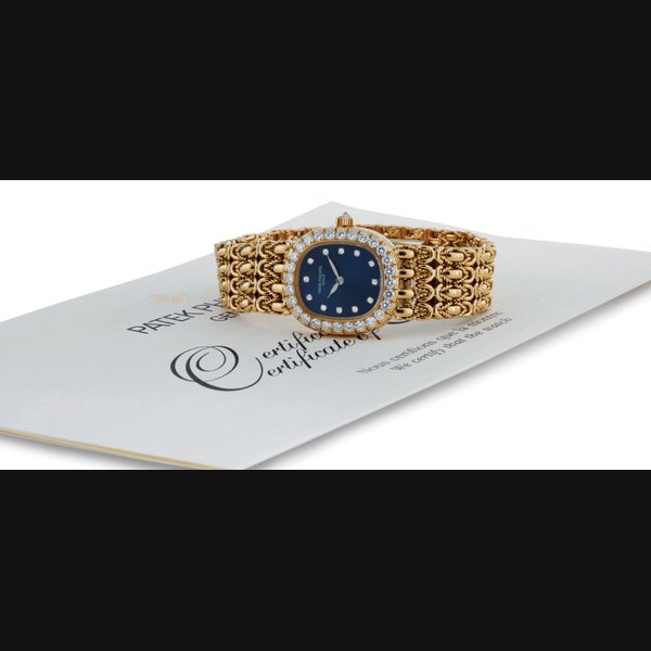 PATEK PHILIPPE. A LADY'S FINE 18K GOLD AND DIAMOND CUSHION BRACELET WATCH SIGNED PATEK PHILIPPE, GENEVE, ELLIPSE, MOVEMENT NO. 3070212, CASE NO. 4075228, REF. 4931/2, MANUFACTURED IN 2002