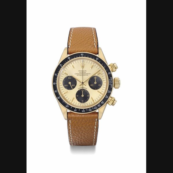 Rolex Rolex. A very rare and attractive 18K gold chronograph wristwatch with brown subsidiary dials SIGNED ROLEX, OYSTER, SUPERLATIVE CHRONOMETER, OFFICIALLY CERTIFIED, COSMOGRAPH, REF. 6263, CASE NO. 5'126'721, MANUFACTURED IN 1977