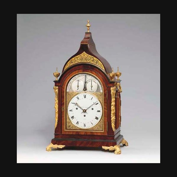 A Victorian mahogany and rosewood gilt-brass mounted musical table clock for the Russian market GRAVELL & TOLKEIN, LONDON, NO. 3790. CIRCA 1860