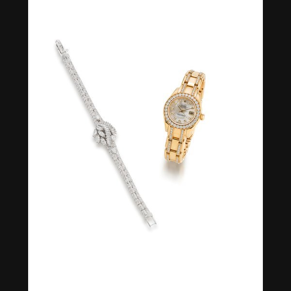 Rolex Rolex. A lady's 18K gold diamond set and mother of pearl automatic calendar bracelet watchDatejust Pearlmaster, Ref:2078, Serial No.80***, Movement No.1488***, Circa 2008 · 2078