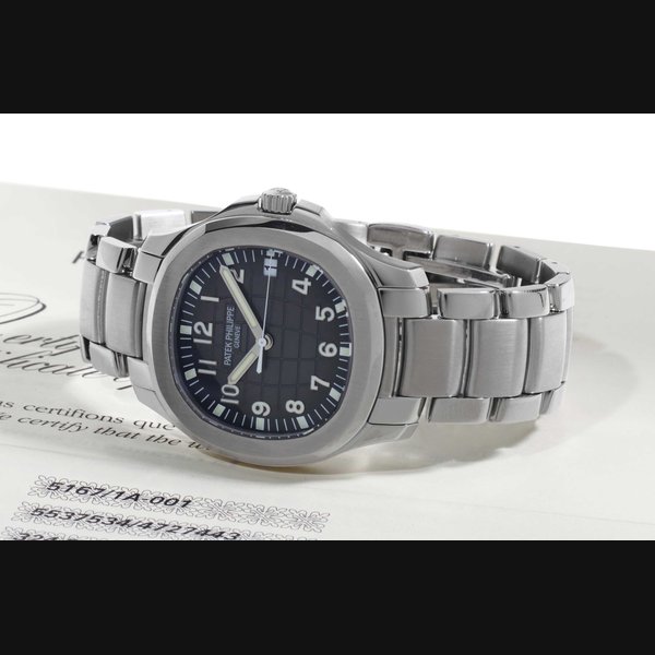 Patek Philippe. A Stainless Steel Automatic Wristwatch With Date, Center Seconds, Bracelet And Original Certificate SIGNED PATEK PHILIPPE, GENEVE, AQUANAUT MODEL, REF. 5167, MOVEMENT NO. 5'537'534, CASE NO. 4'727'443, CIRCA 2010
