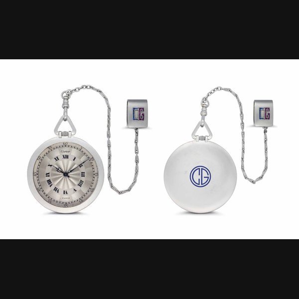 Cartier Cartier. A Platinum Openface Dress Watch with Sapphire and Ruby-set Fob Signed Cartier, Paris, Case No. 4893, EJ for Edmond Jaeger, Circa 1910