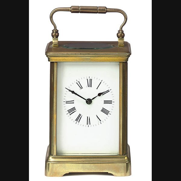 A French brass eight day striking carriage clock CIRCA 1900