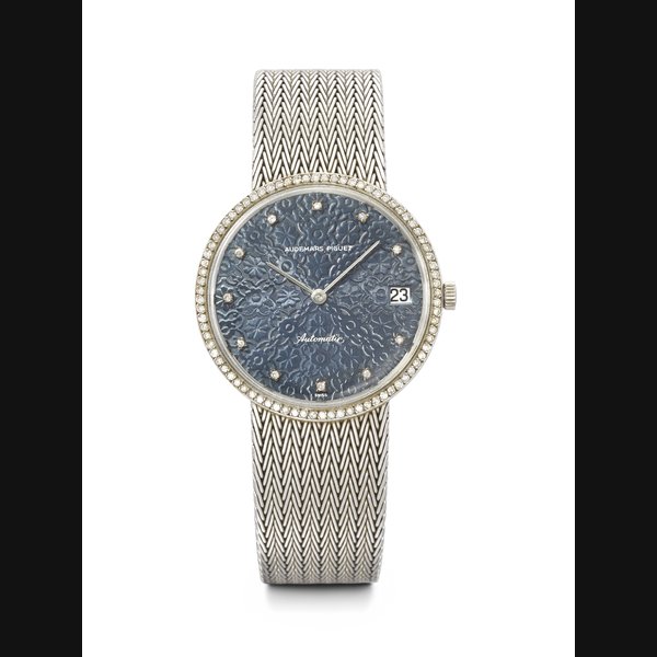 AUDEMARS PIGUET. AN EXTREMELY RARE AND UNUSUAL 18K WHITE GOLD AND DIAMOND-SET AUTOMATIC BRACELET WATCH REF. 5404BC, CASE NO. 92'988, CIRCA 1975