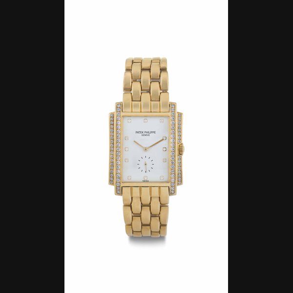 Patek Philippe. A Fine 18k Gold and Diamond-Set Rectangular Bracelet Watch SIGNED PATEK PHILIPPE, GENÈVE, GONDOLO MODEL, REF. 5025/1, MOVEMENT NO. 1'865'215, CASE NO. 4'029'782, MANUFACTURED IN 1998