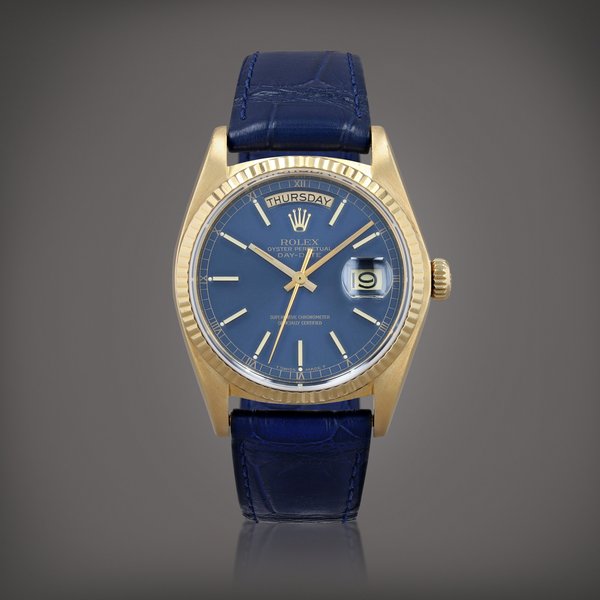 Rolex Day-Date, reference 18038     Montre bracelet en or jaune avec jour et date |  Yellow gold wristwatch with day, date     Vers 1980 |  Circa 1980