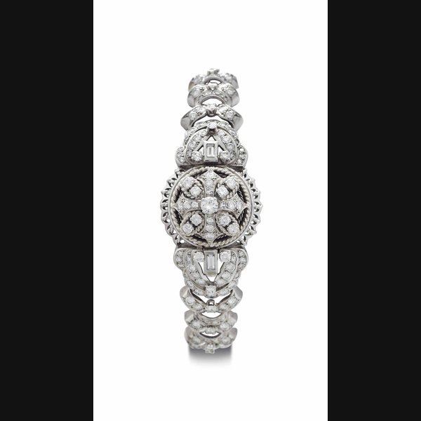 Jaeger-Lecoultre Jaeger-LeCoultre. A Lady's 18k White Gold and Diamond-set Bracelet Watch with Concealed Dial SIGNED JAEGER-LECOULTRE, NO. 112'447, CIRCA 1950