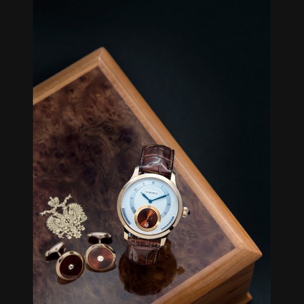 Fabergé. An 18K rose gold enamel and guilloché engraved manual wind wristwatch and cufflink set with box and papers Agathon, Ref:M1107BR, No.08/25, Sold 25th April 2007